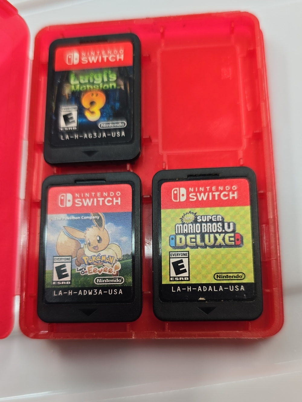 Nintendo Switch Game Card Trio with Red Case - Mario, Luigi, Pokémon